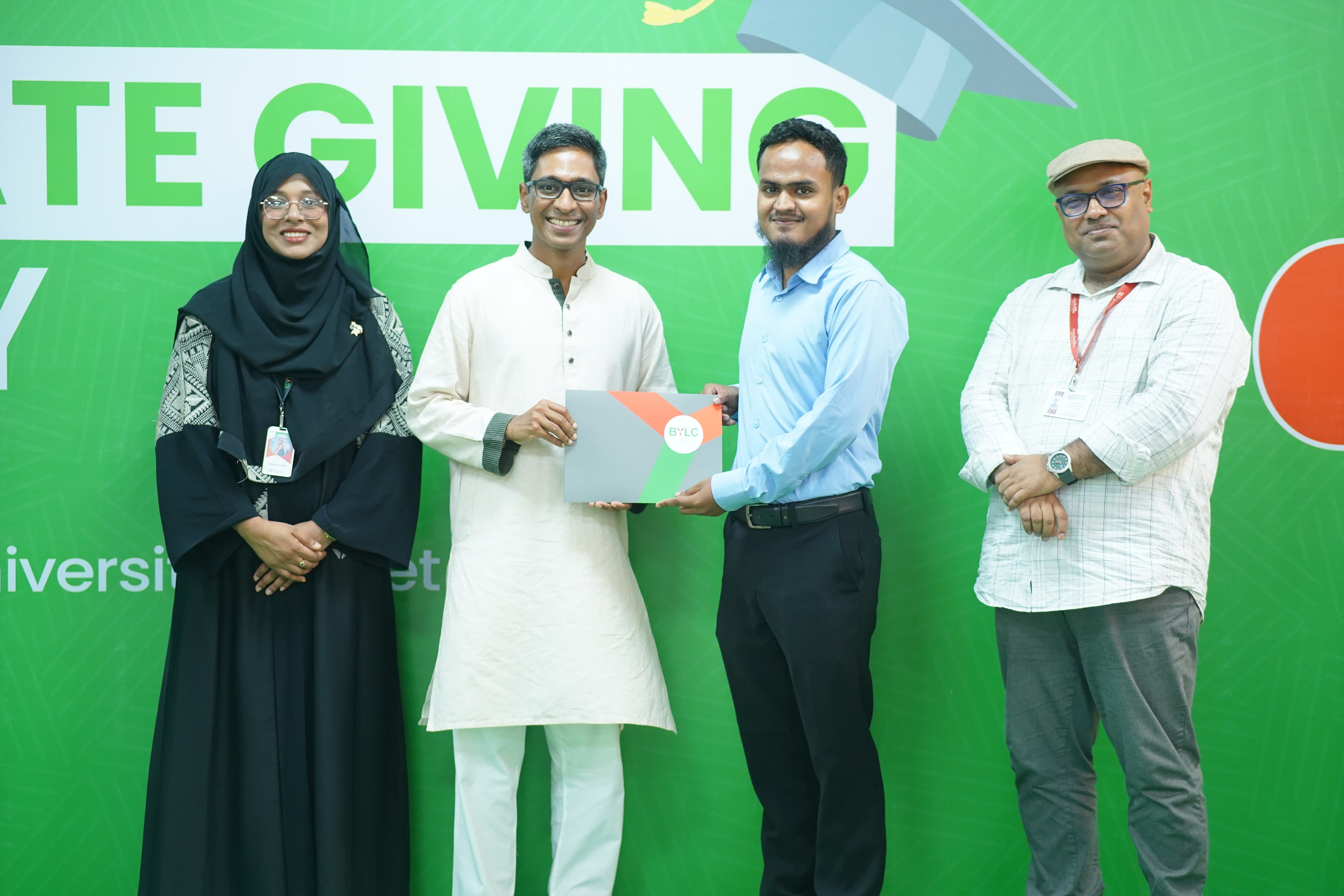Habib receiving recognition at BYLC graduation